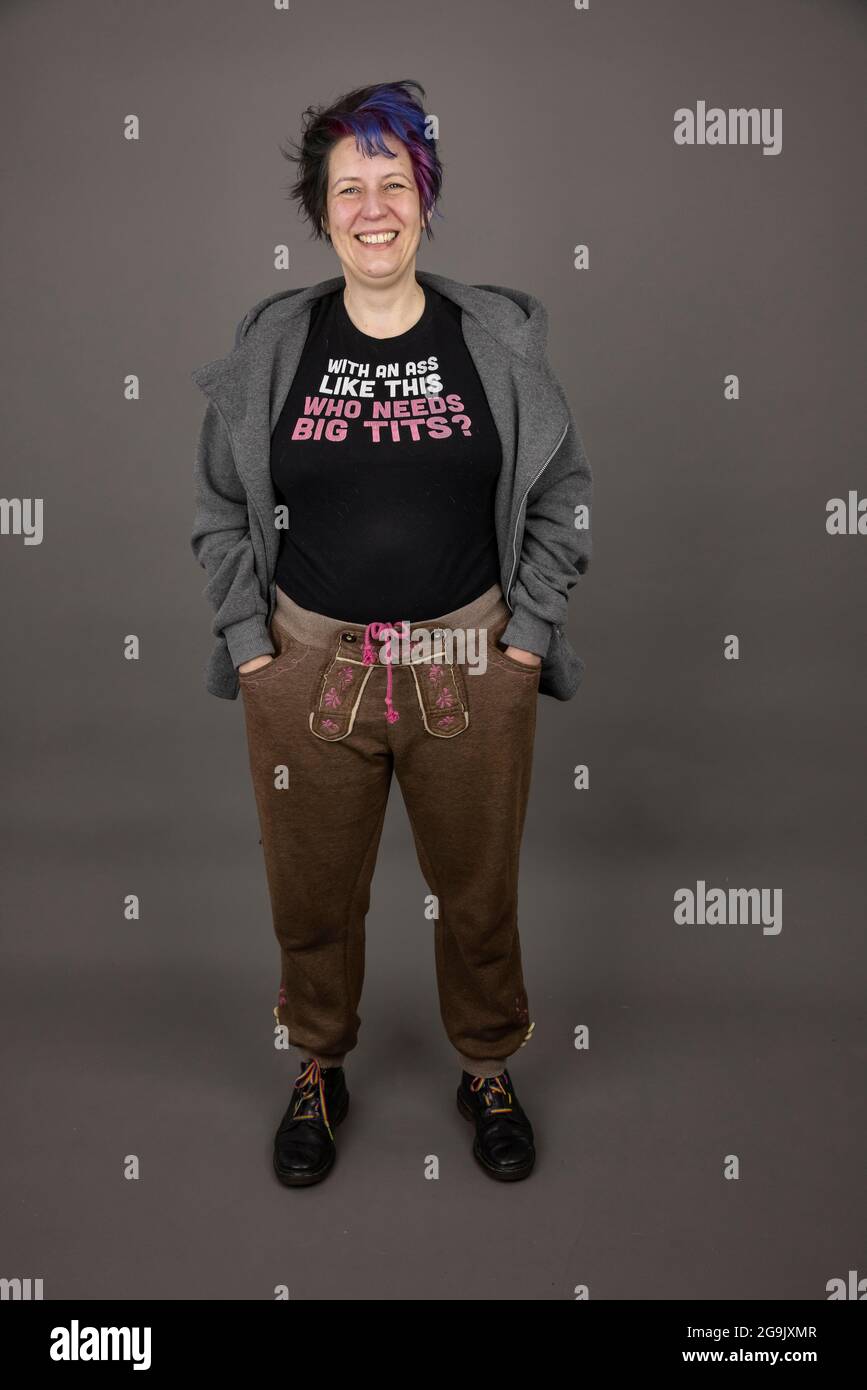 Woman with funny, sexist slogan on her t-shirt, studio shot, Germany Stock Photo