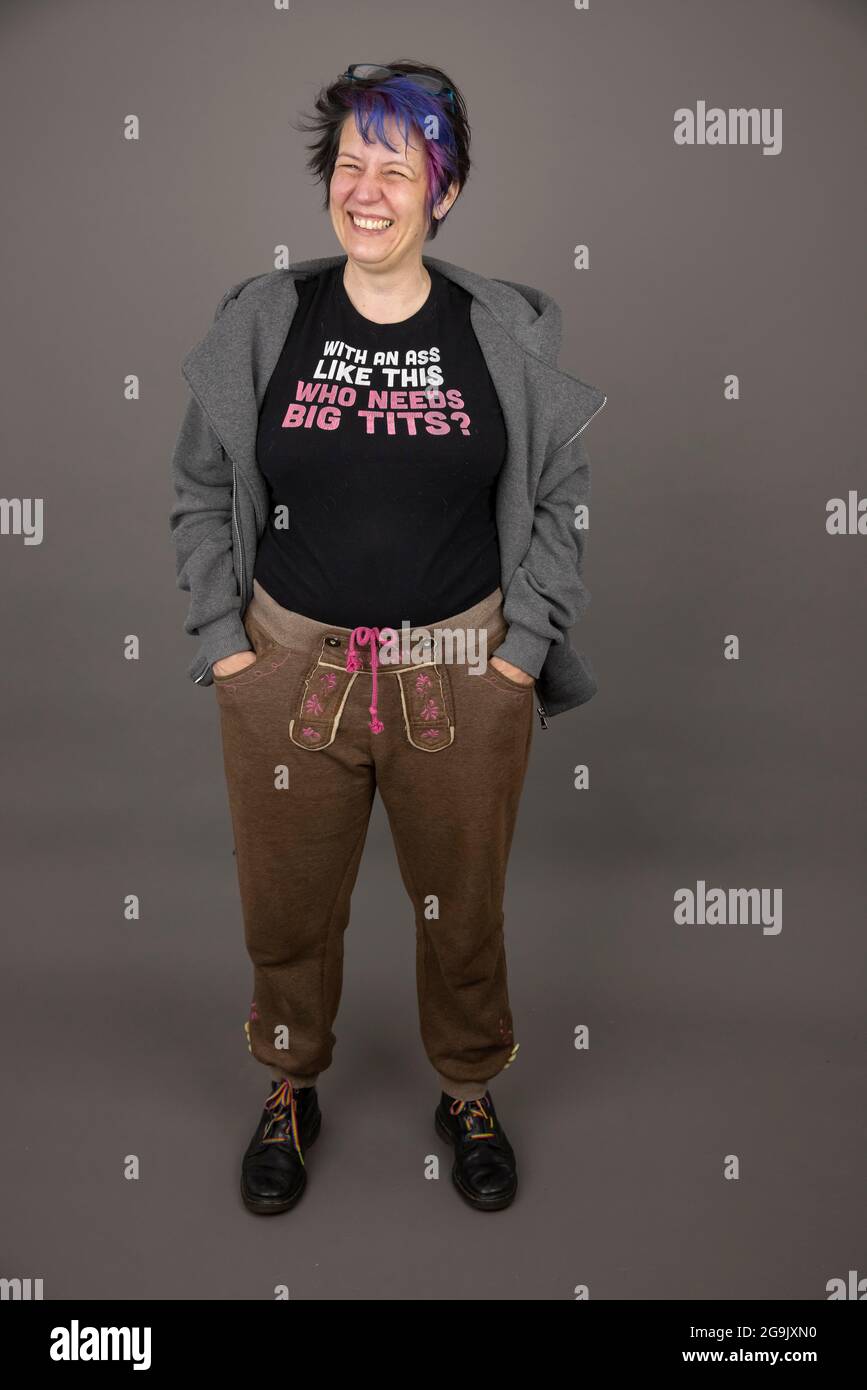 Woman with funny, sexist slogan on her t-shirt, studio shot, Germany Stock Photo