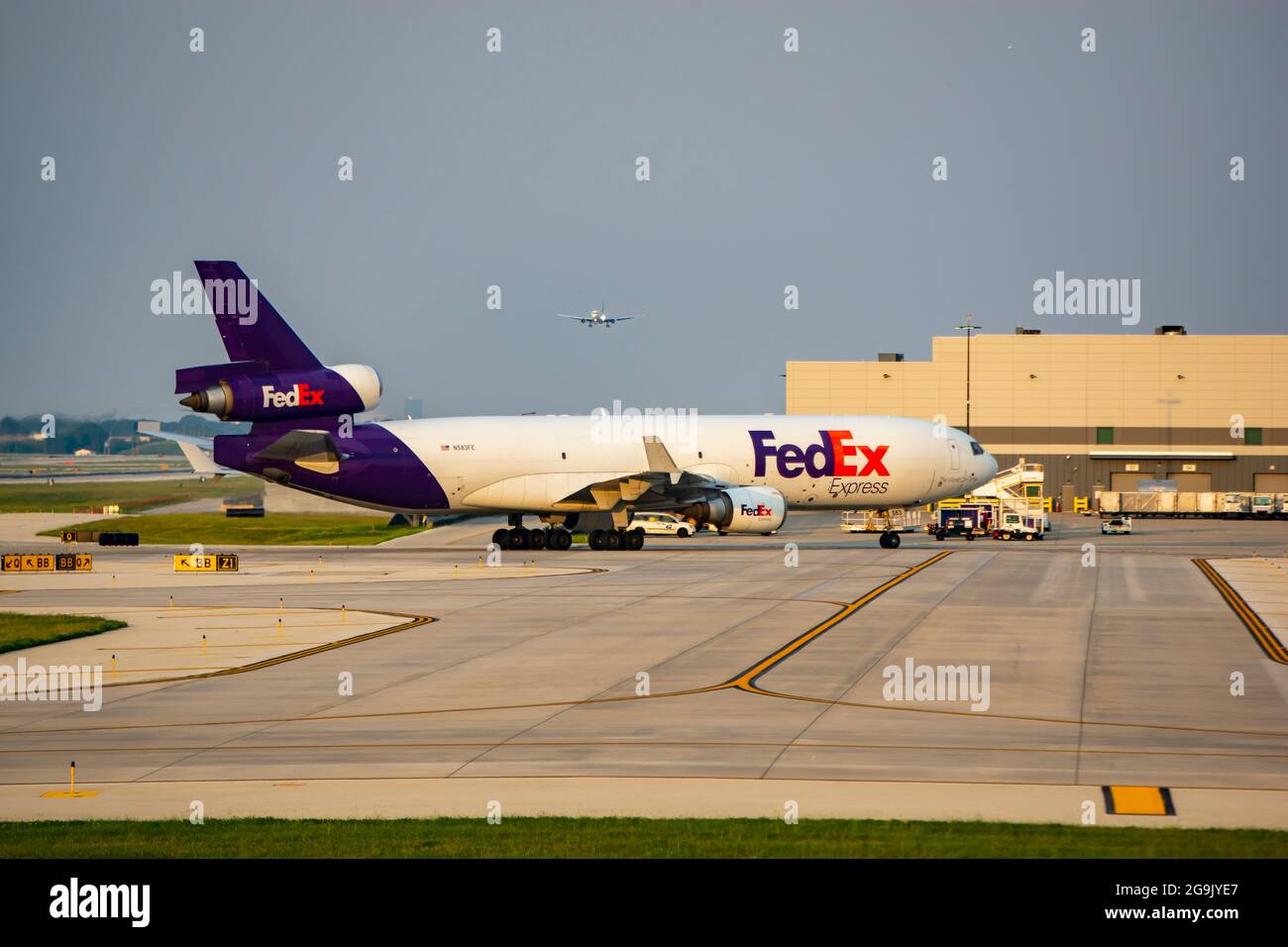 Chicago, IL, United States - July 25, 2021: FedEx Express McDonnell MD-11F (tail number N583FE) tri-jet taxiing at Chicago O'Hare International Airpor Stock Photo
