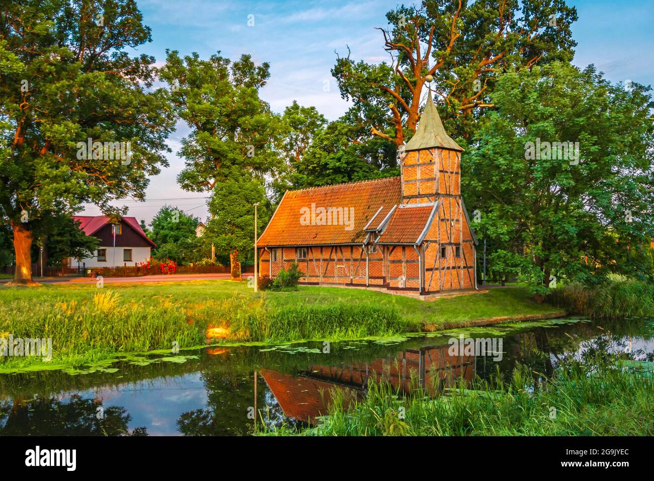 The timber framing bulding. Catholic church in the village of Wroblewo, Sperlingsdorf, Poland Stock Photo