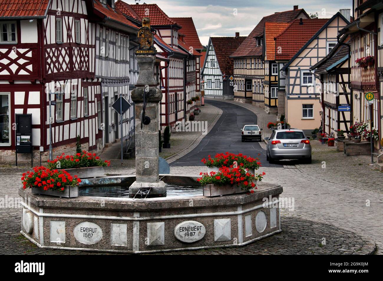 Fountain with golden lion, street with half-timbered houses, medieval town, smallest town in Thuringia, Heldburger Zipfel, Heldburger Land, Green Stock Photo