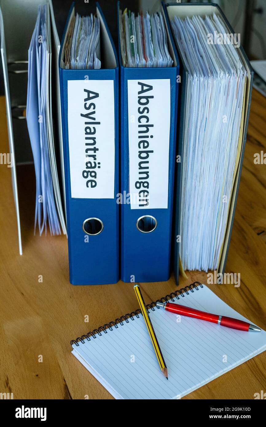 Folder with inscription Asylum applications, deportations, Austria Stock Photo