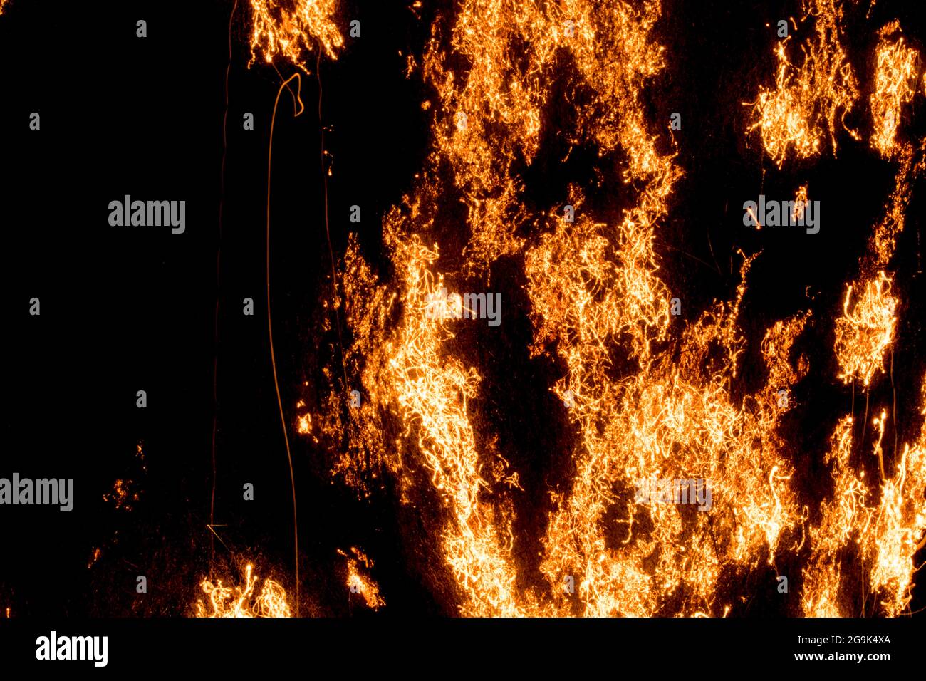FIRE steel wool filaments burning, oxidizing, smoldering. Resembling