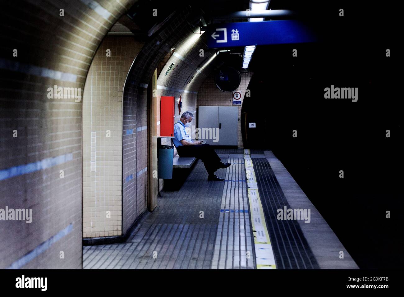 Man sitting platform train hi-res stock photography and images - Alamy