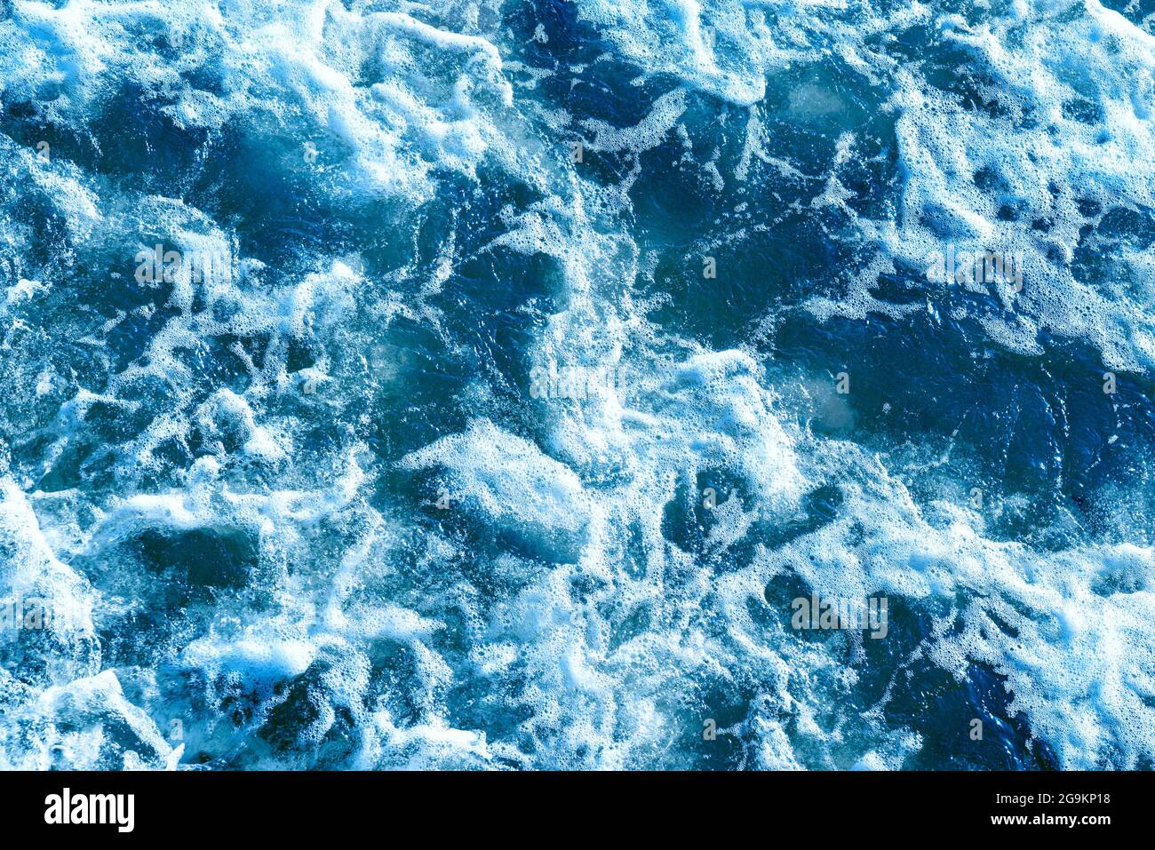 Deep blue sea water spray