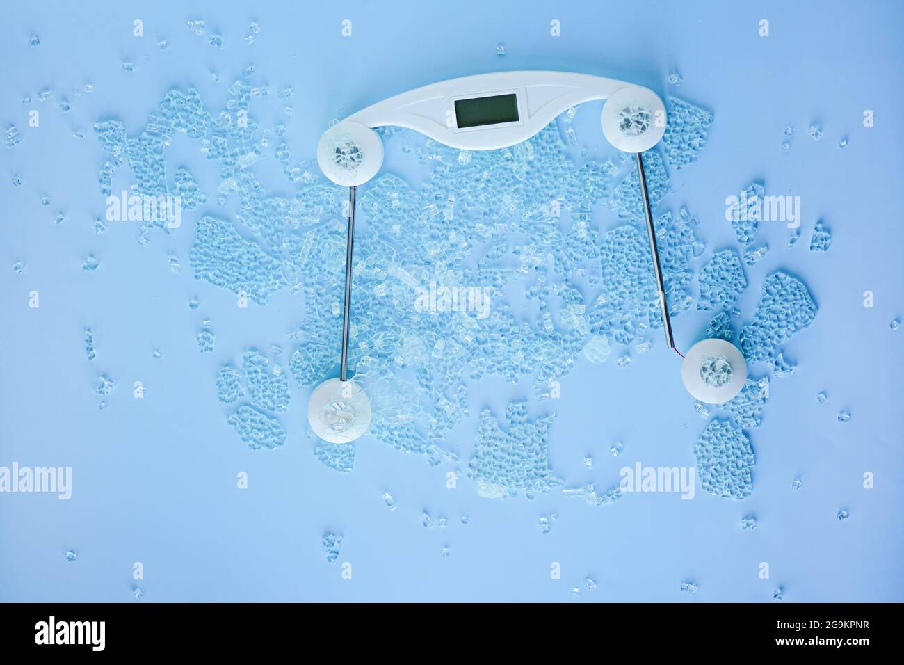 Broken digital human scale on the floor for measuring people.Cracked