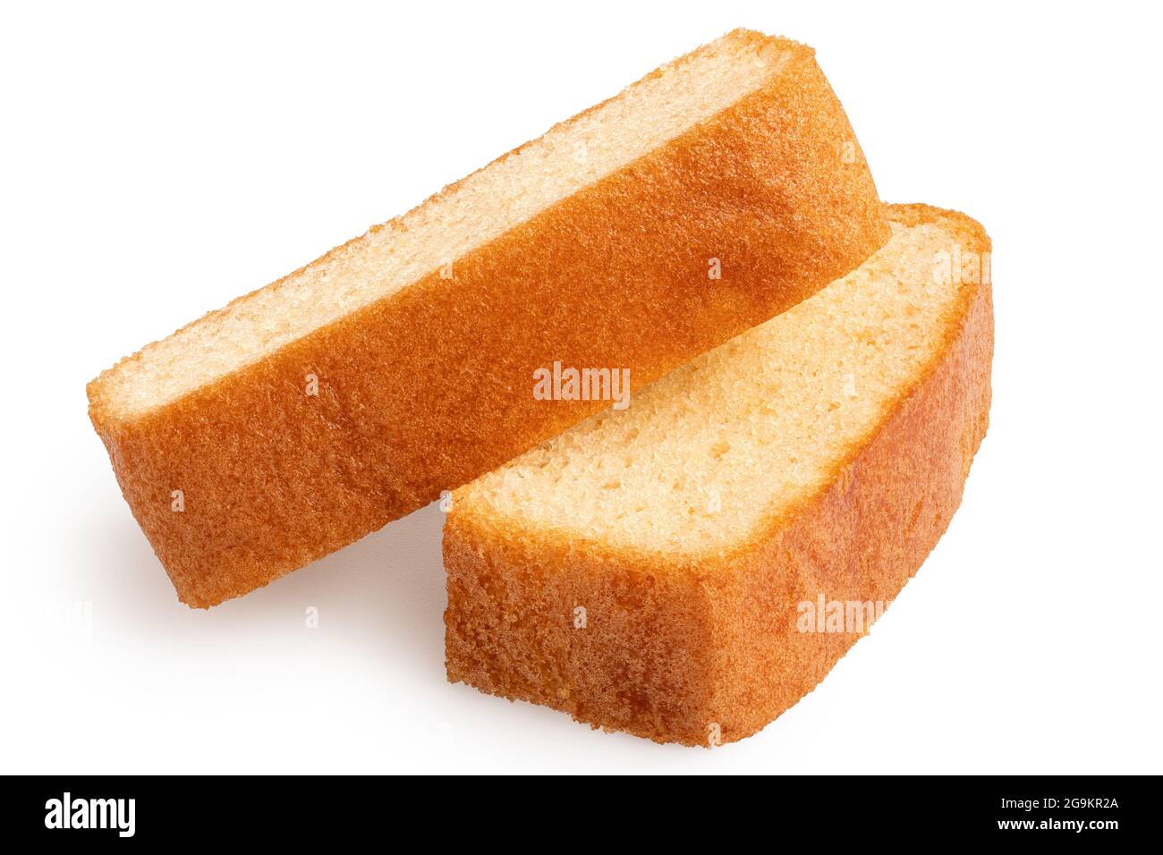 Two slices of plain sponge cake lying flat isolated on white. Stock Photo