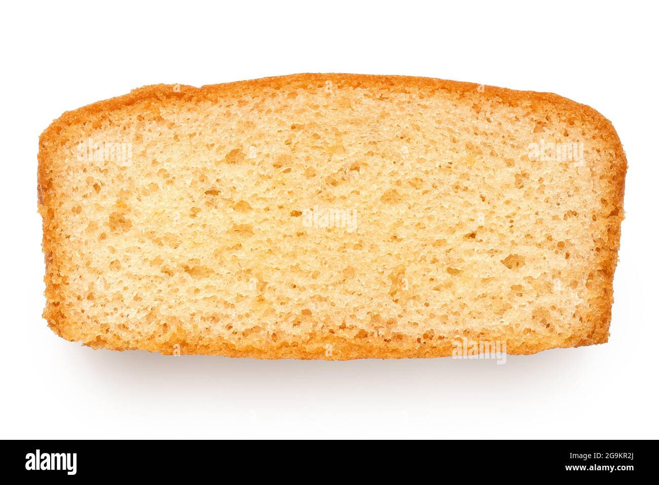 Slice of plain sponge cake isolated on white. Top view. Stock Photo