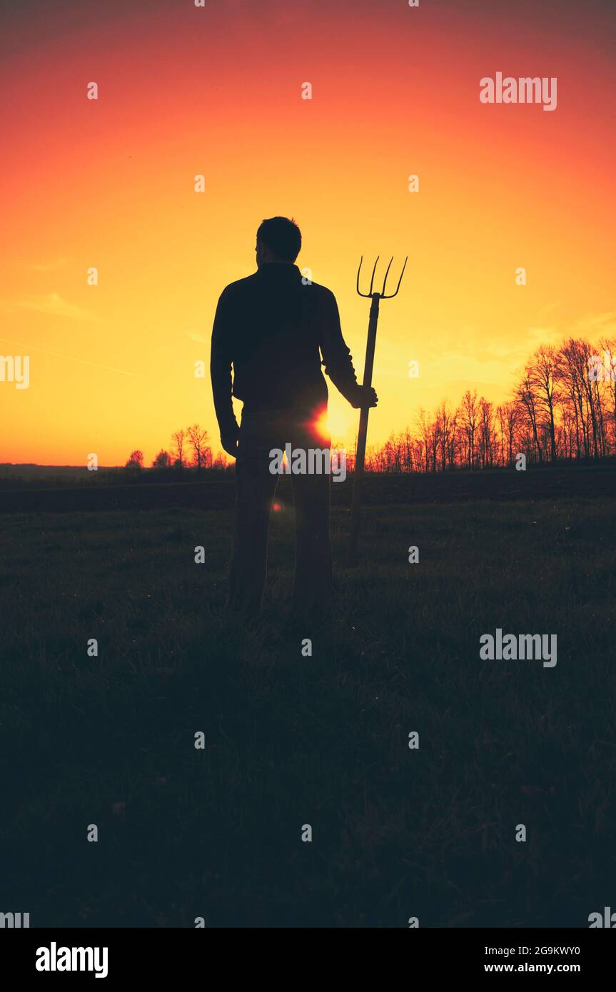 Boy pitchfork hires stock photography and images Alamy