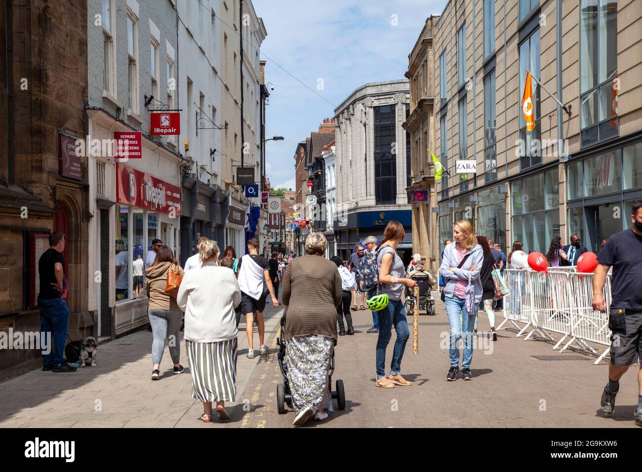 People Visitoing Shops on Spurriergate in York, UK Stock Photo