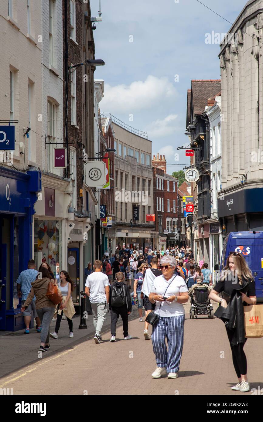 People Visitoing Shops on Spurriergate in York, UK Stock Photo