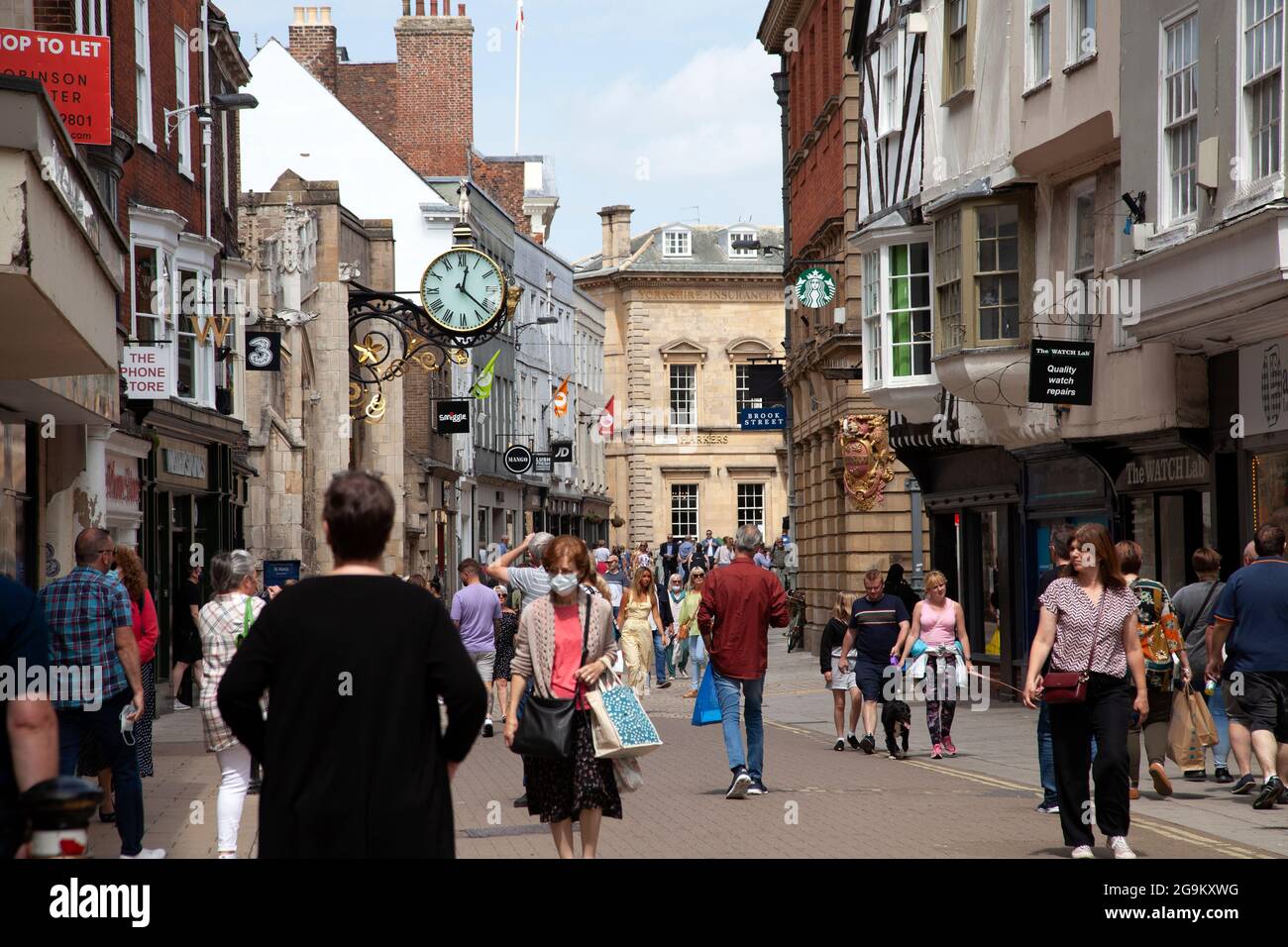 People Visiting Shops on Coney Street in York, UK Stock Photo