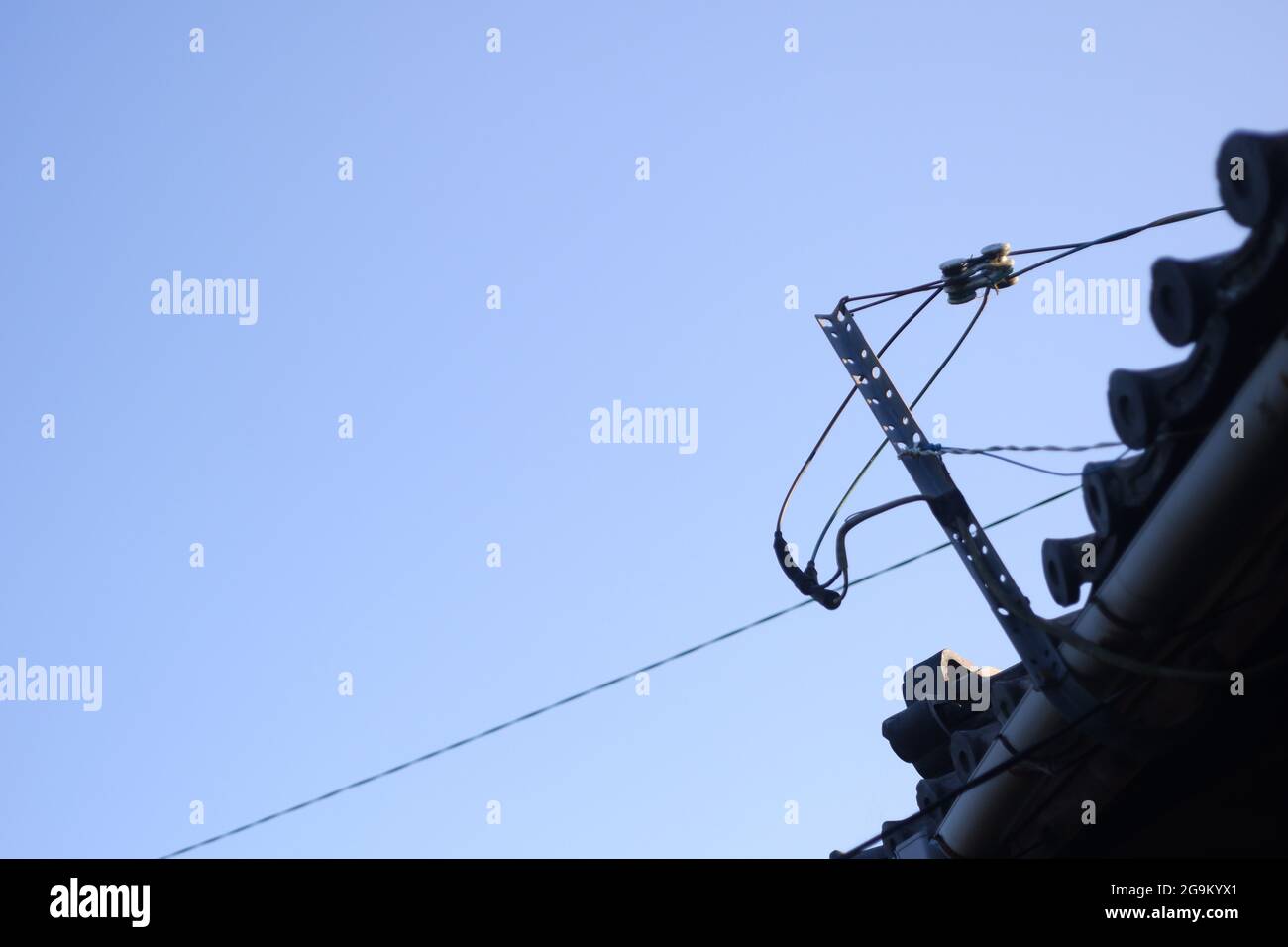 Electric cables on the roof Stock Photo Alamy