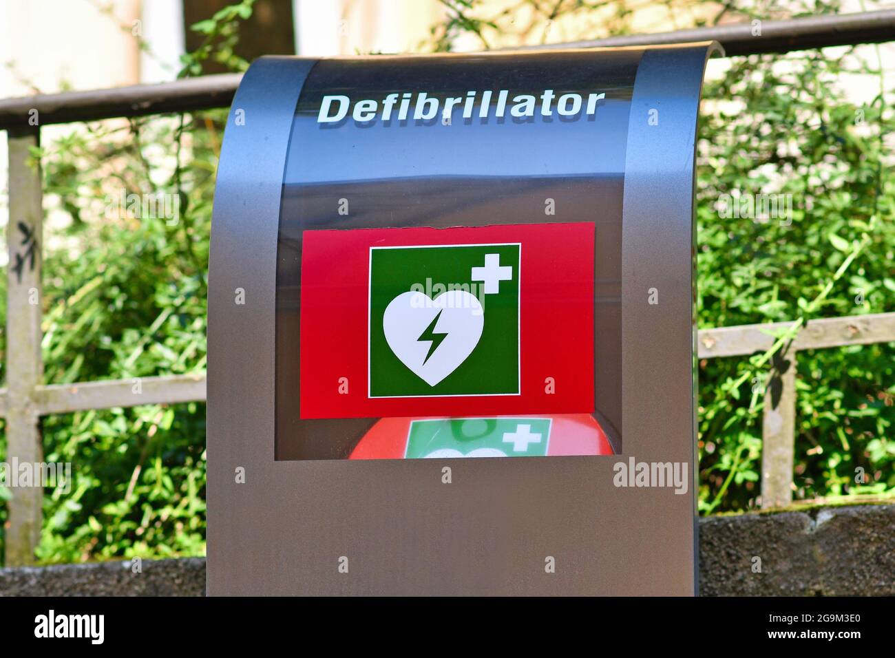 Heart defibrillator box in German street Stock Photo