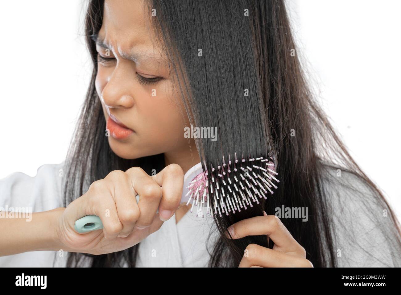 Stuck hair comb hires stock photography and images Alamy