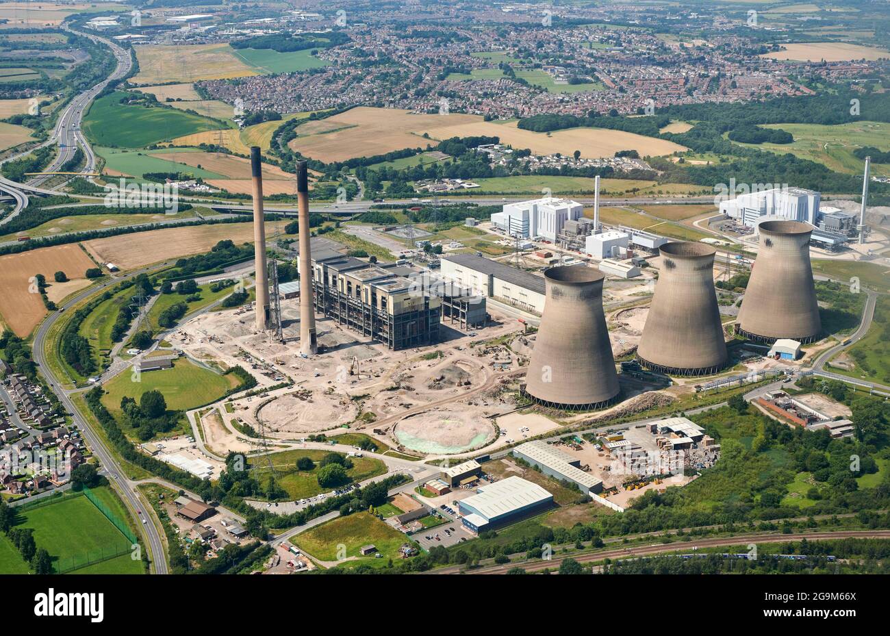 An aerial view of the demolition of the Power station, Ferrybridge, West Yorkshire, northern England, UK, 3 cooling towers gone Stock Photo