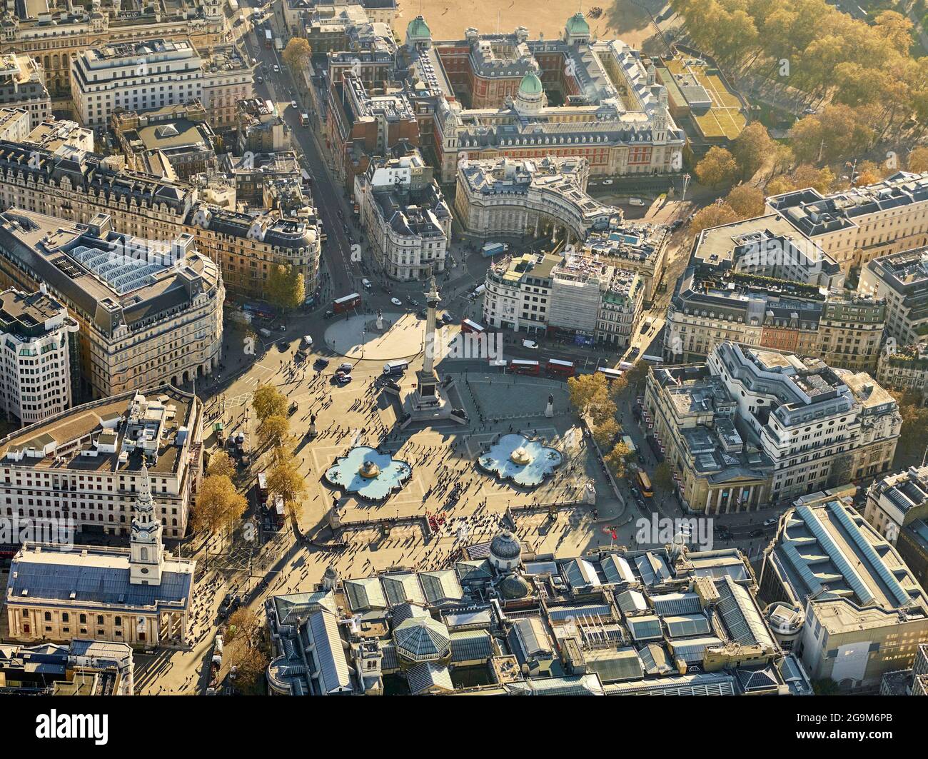 An aerial photograph of Trafalgar Square, busy with tourists ,London, UK looking south to Whitehall Stock Photo