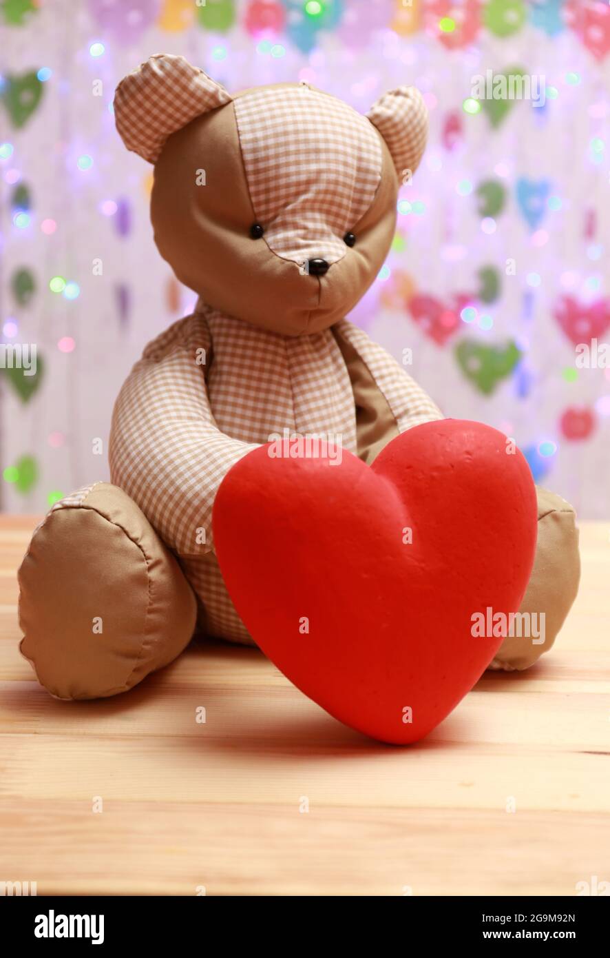 Teddy Bear With Red Heart On Festive Background Stock Photo Alamy