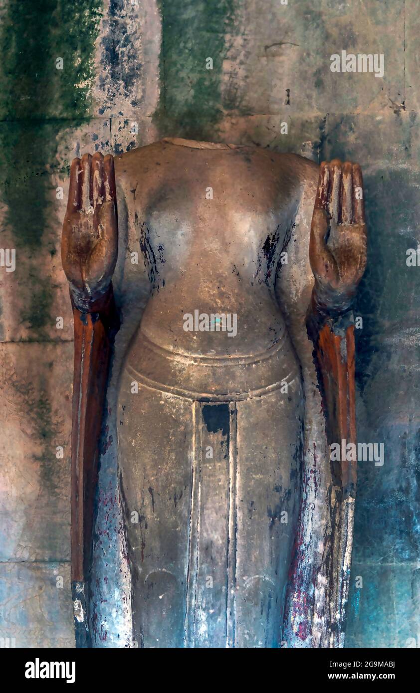 Decapitated statue, Angkor Wat Stock Photo