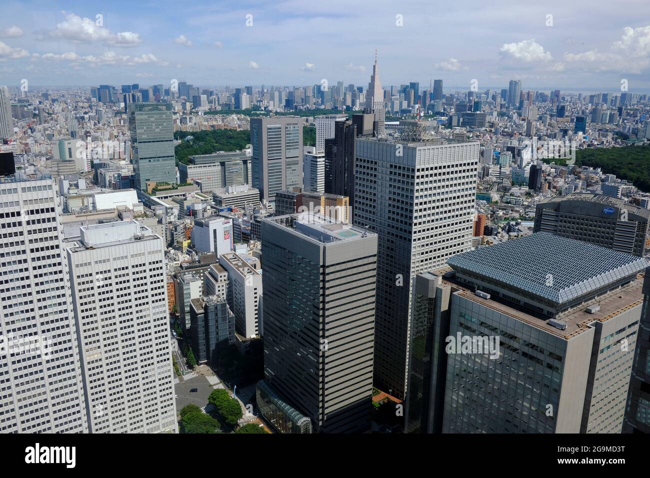 Tokyo, Japan. 16th July, 2021. View of Shinjuku Park Tower from the Tokyo Metropolitan Government Building in Shinjuku district, Tokyo. Credit: SOPA Images Limited/Alamy Live News Stock Photo