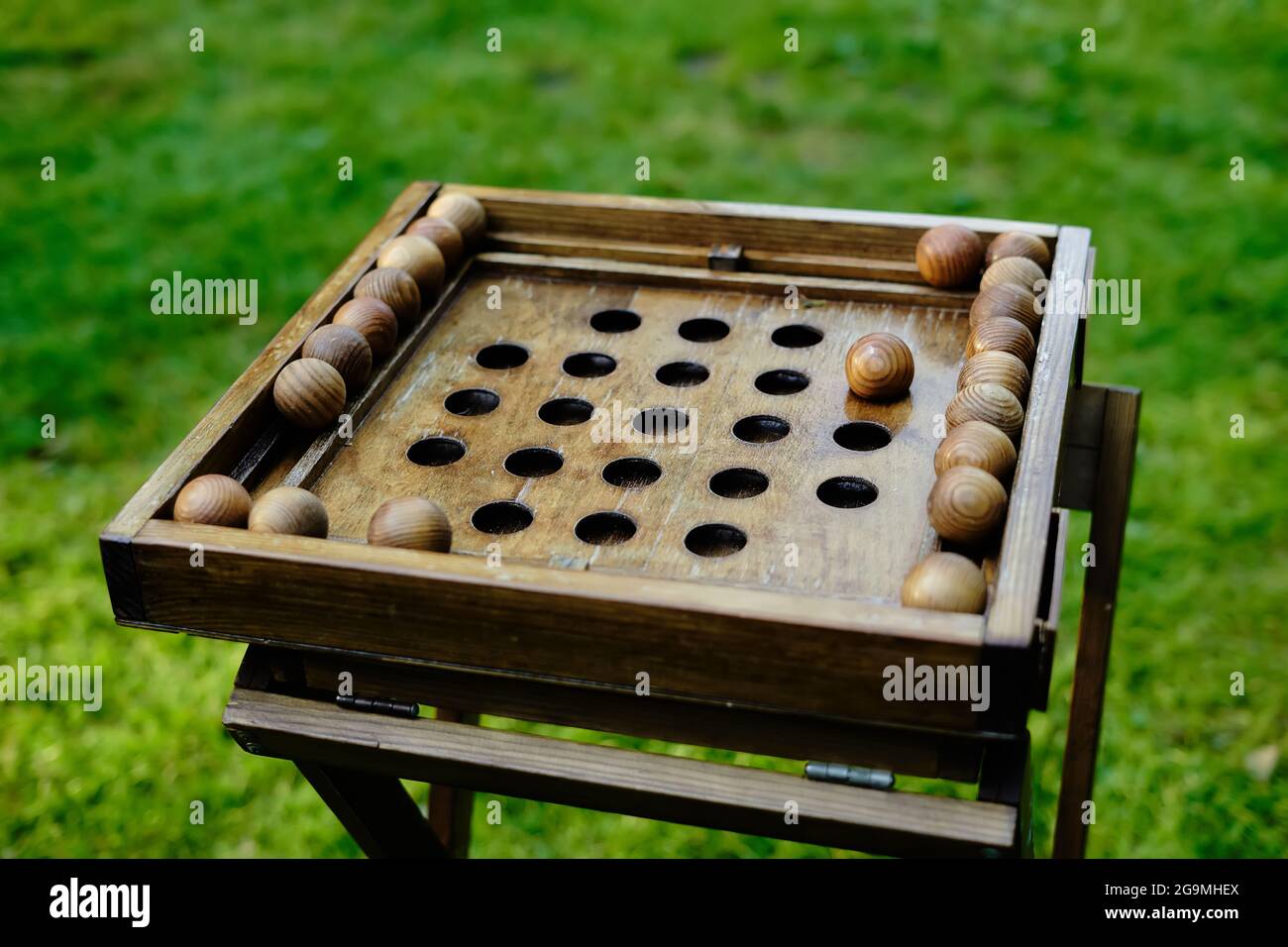 outdoor board game on a wooden board Stock Photo Alamy