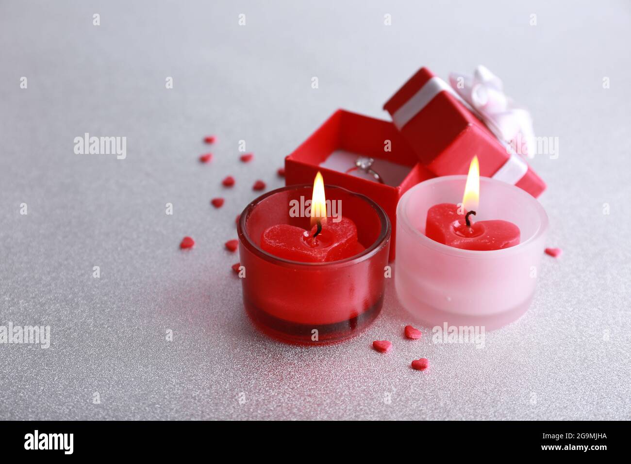 Romantic gift with candles, love concept Stock Photo Alamy