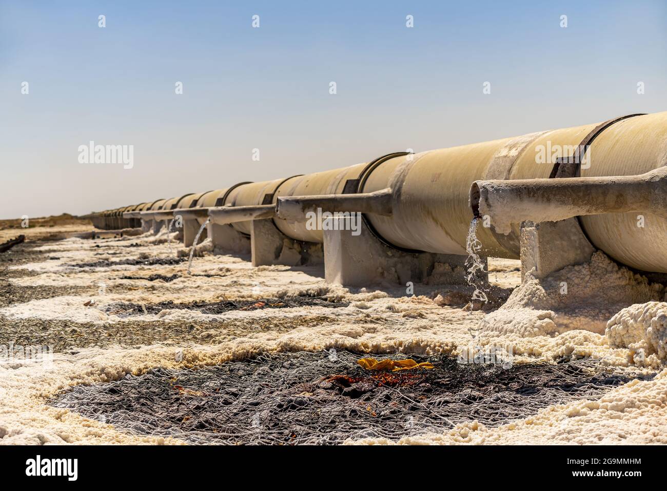 Pipe with salty water for salt production Stock Photo Alamy