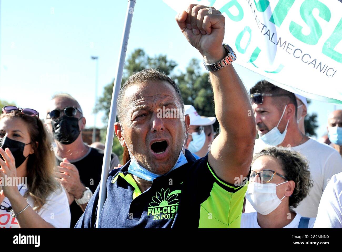 Whirlpool company workers demonstrate against the dismissals, during the visit of the president of the council of ministers of the Italian republic Ma Stock Photo