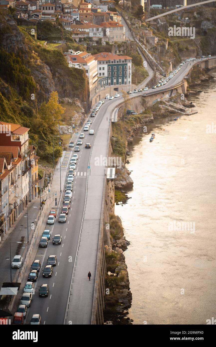 PORTO, PORTUGAL - Feb 28, 2021: A vertical shot of long and tedious traffic in one on the main road of Porto, Portugal Stock Photo