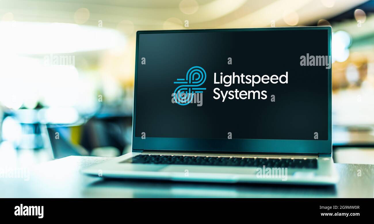 POZNAN, POL - JUN 12, 2021: Laptop computer displaying logo of Lightspeed Systems, a company that builds SAAS content-control software, mobile device Stock Photo