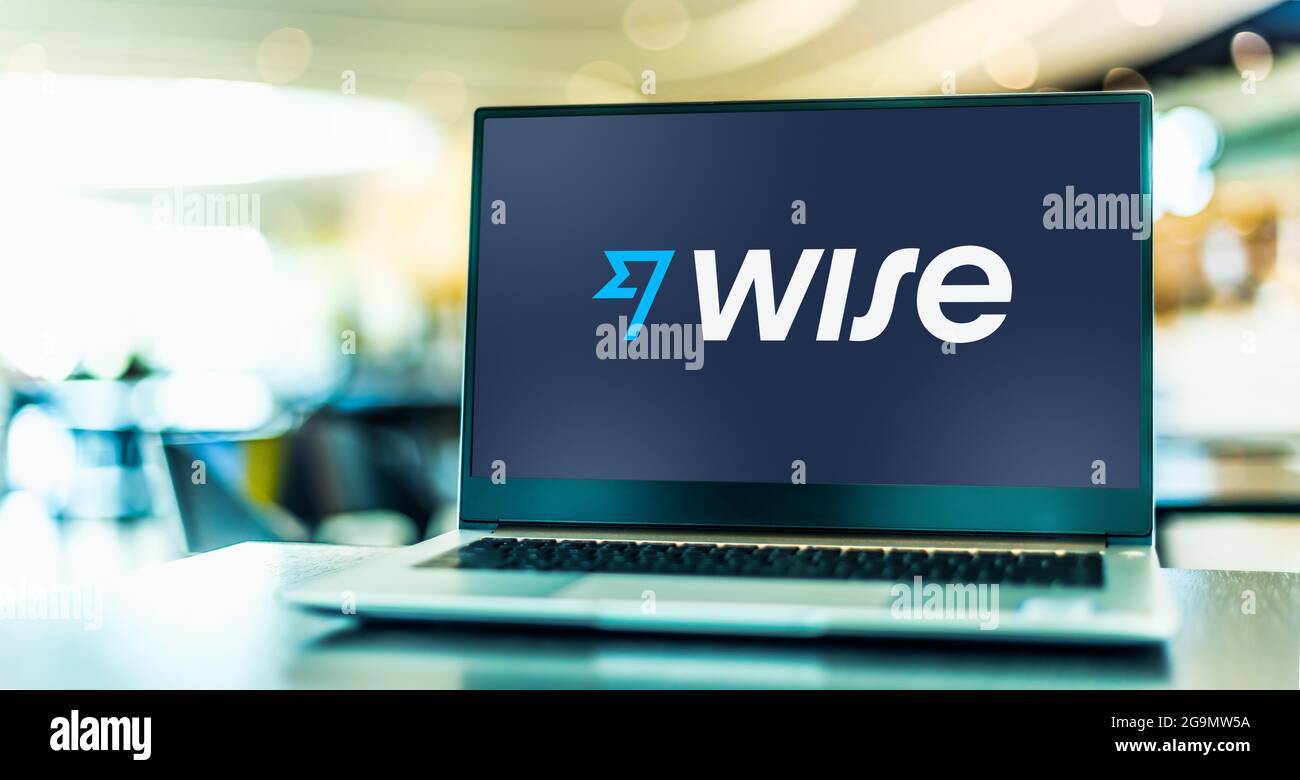 Wise Computer POZNAN, POL - JUN 12, 2021: Laptop computer displaying logo of Wise, a ...