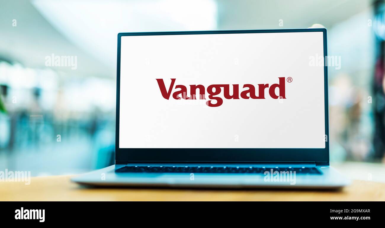 POZNAN, POL - JUL 3, 2021: Laptop computer displaying logo of The Vanguard Group, Inc., an American registered investment advisor based in Malvern, Pe Stock Photo