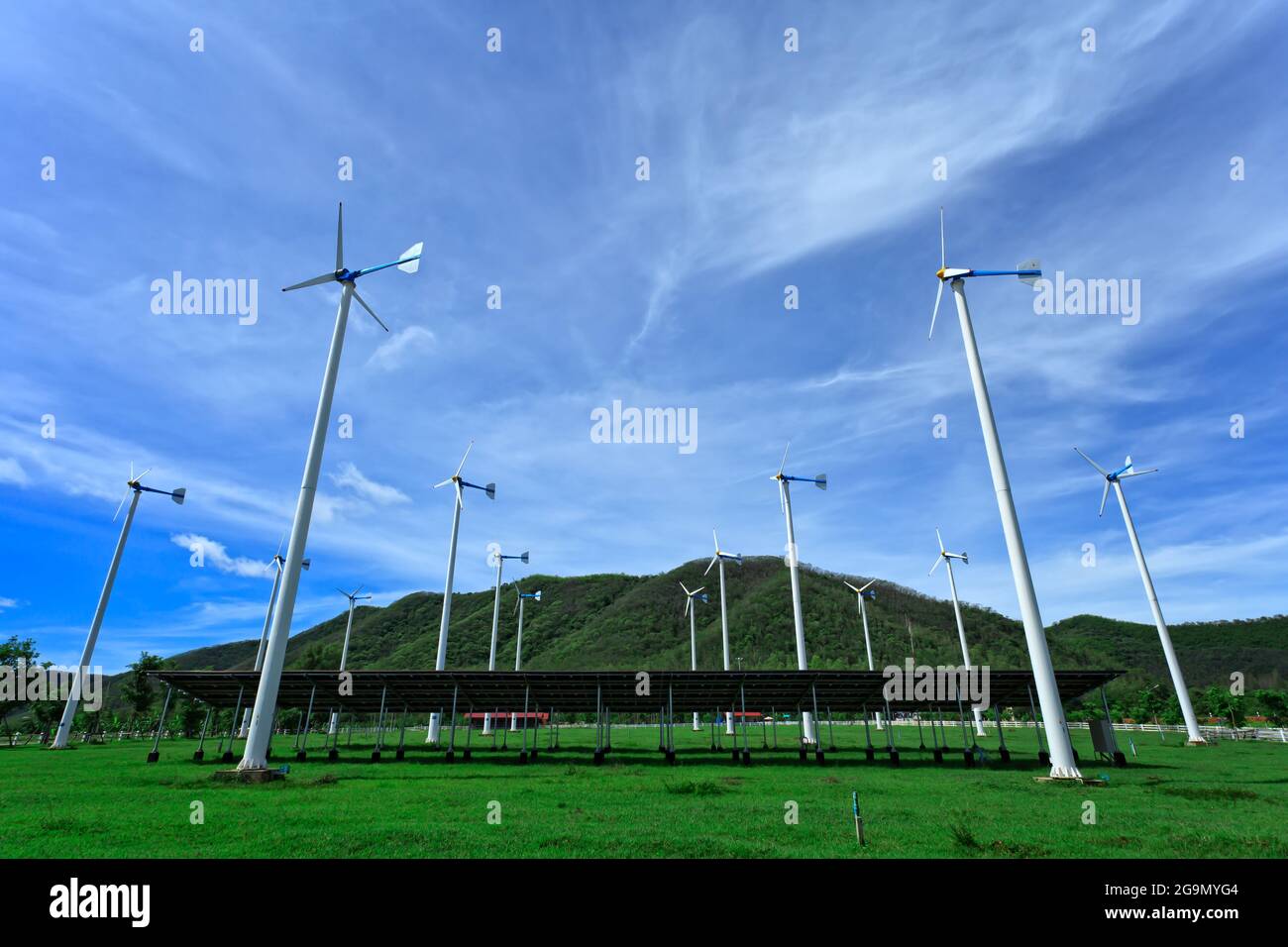 Wind turbines and blue sky Stock Photo - Alamy