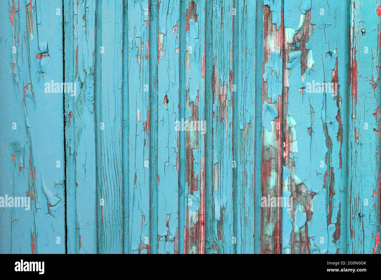 Old weathered board painted blue, abstract background Stock Photo
