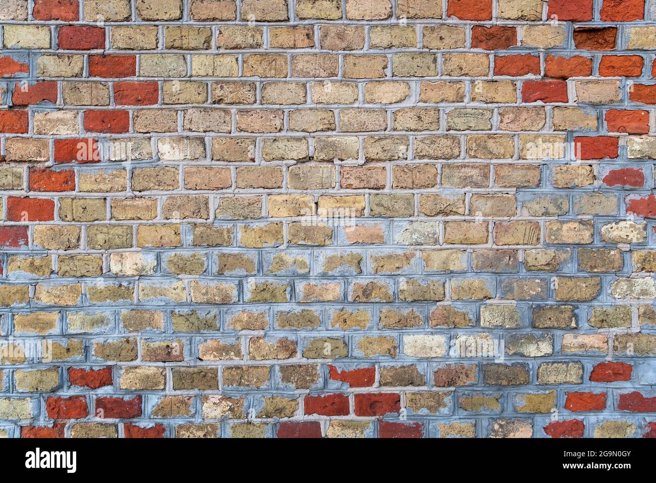 Wall made of old bricks as a background Stock Photo