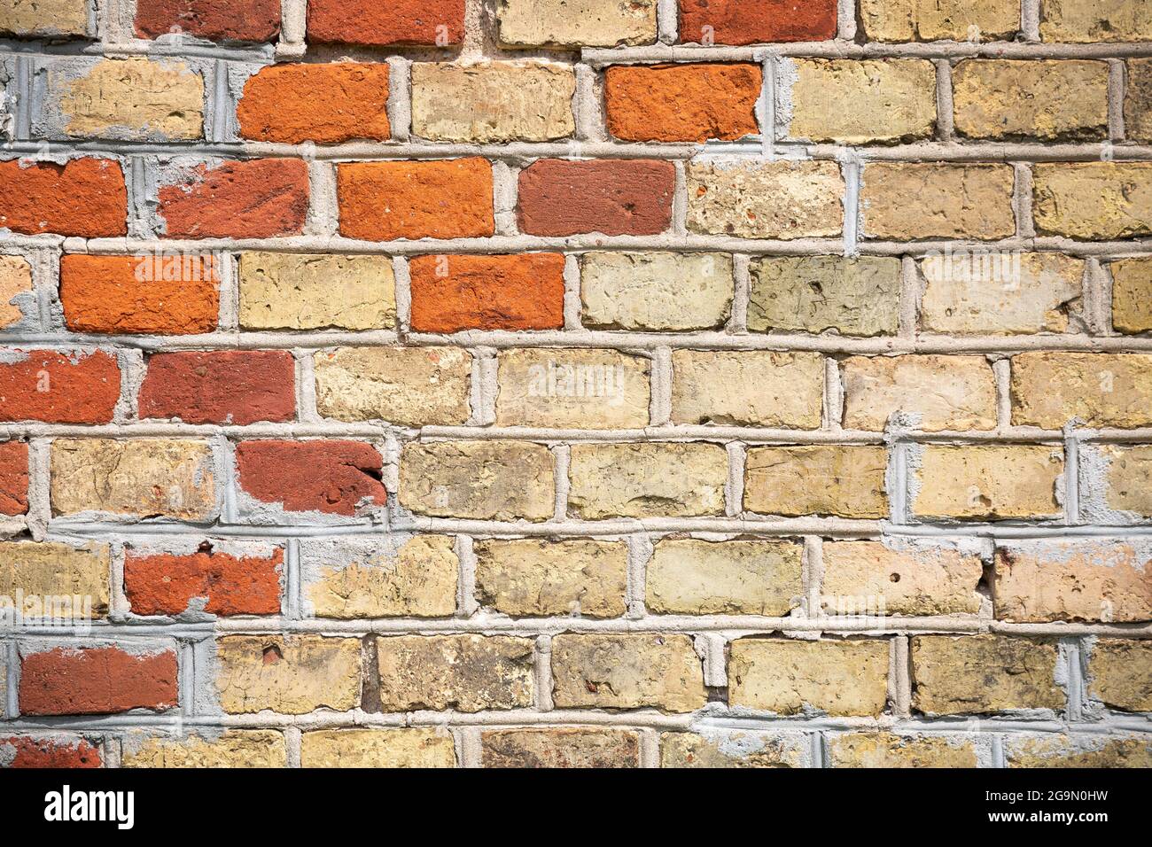 Wall made of old bricks as a background Stock Photo