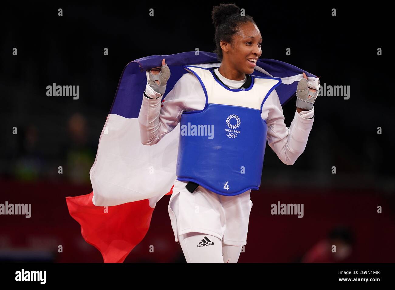 France’s Althea Laurin celebrates defeating Ivory Coast’s Aminata Charlene Traore (left) during the Women +67kg Bronze Medal Contest at Makuhari Messe Hall A on the fourth day of the Tokyo 2020 Olympic Games in Japan. Picture date: Tuesday July 27, 2021. Stock Photo