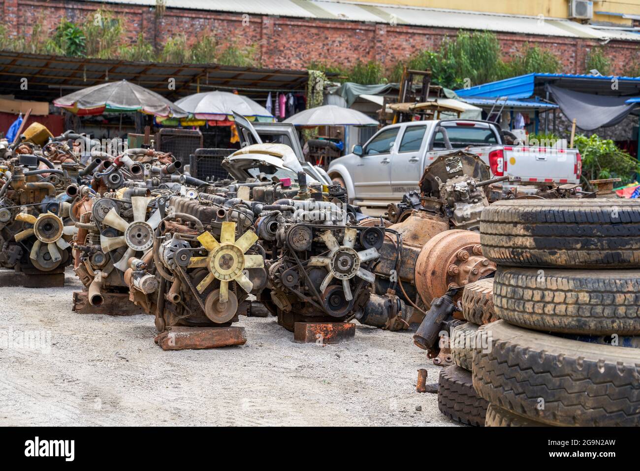 Used car engines and parts in car scrap yard Stock Photo Alamy