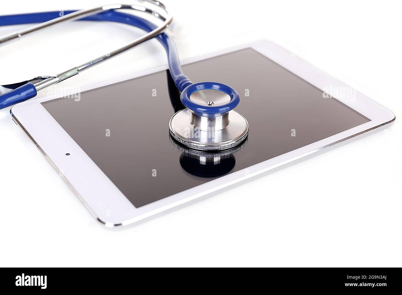 Tablet and blue stethoscope isolated on white Stock Photo - Alamy