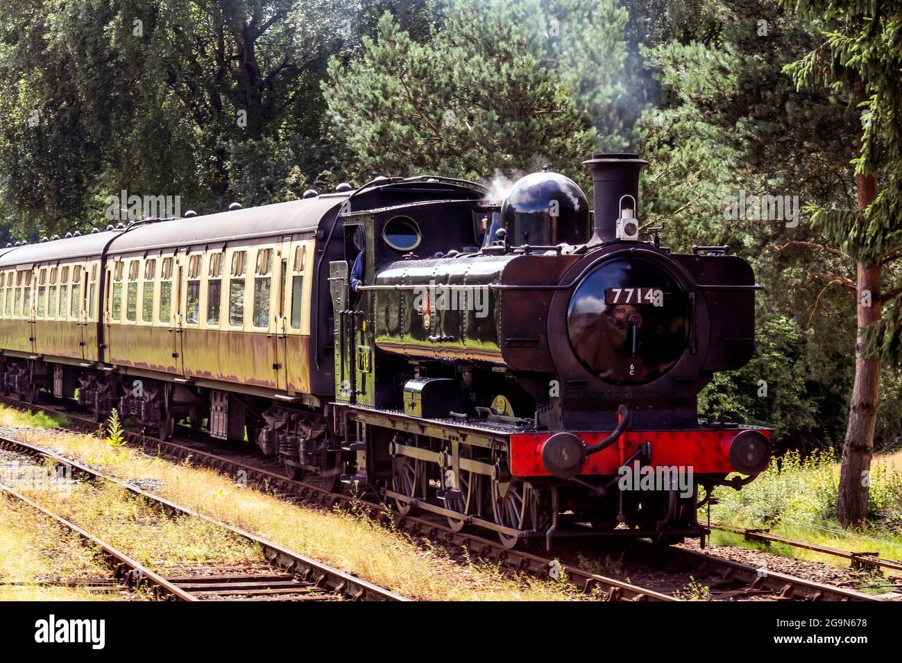 GWR Pannier tank locomotive 7714 heading a passenger train on the Severn Valley Railway Shropshire Stock Photo