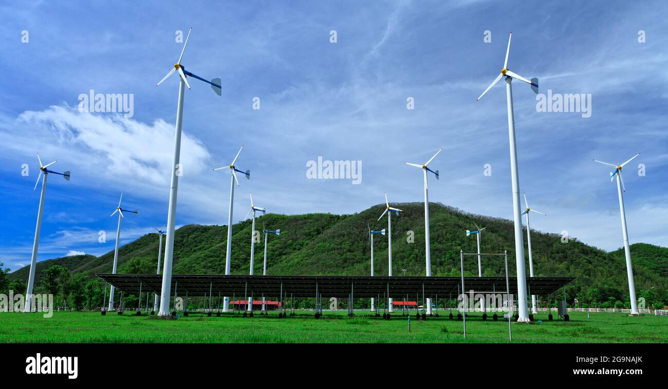 Wind turbines and blue sky Stock Photo - Alamy