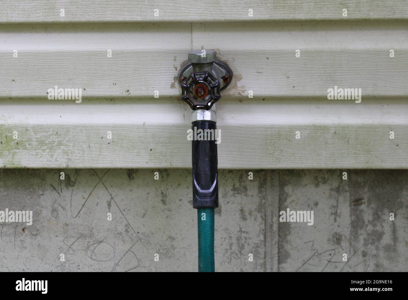 A Common Residential Hose Spigot Stock Photo Alamy