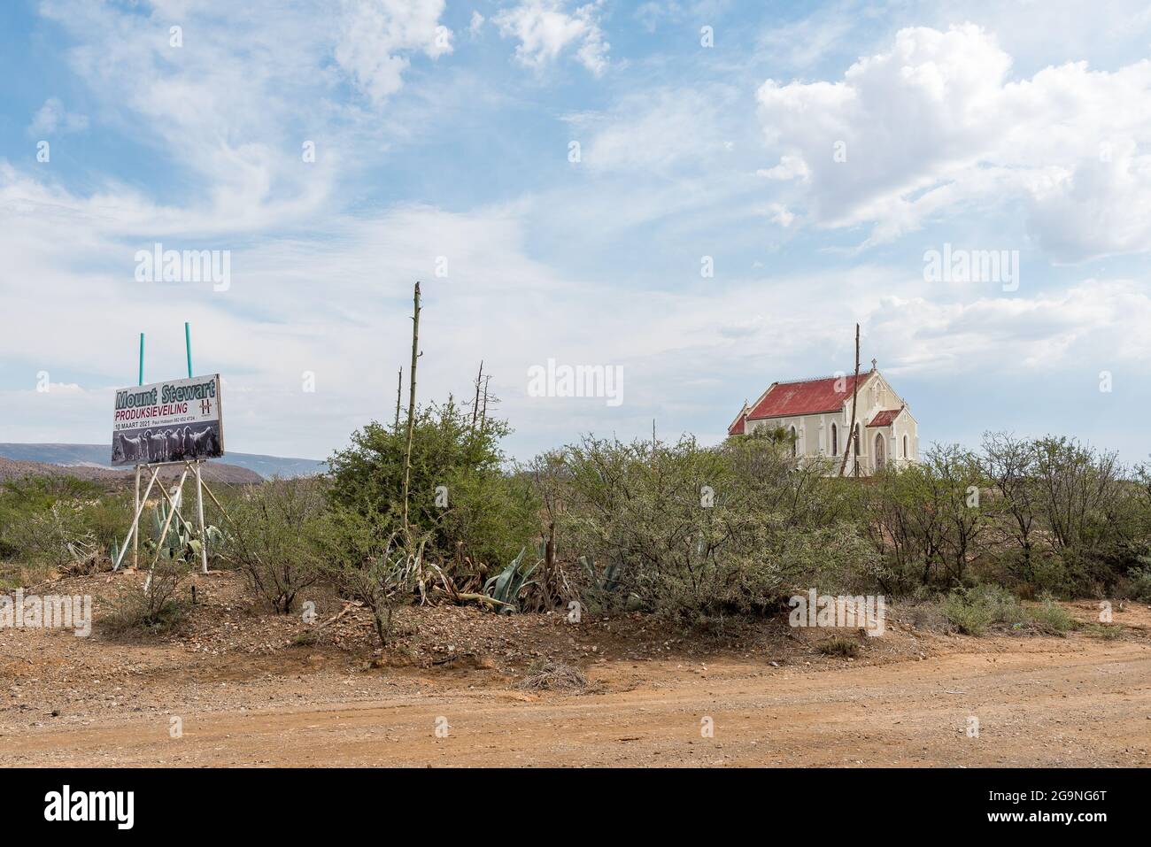MOUNT STEWART, SOUTH AFRICA - APRIL 21, 2021: A scene in Mount Stewart in the Eastern Cape Province. The community church and an auction advertisement Stock Photo