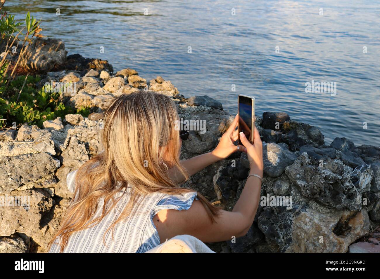 Woman using phone Stock Photo