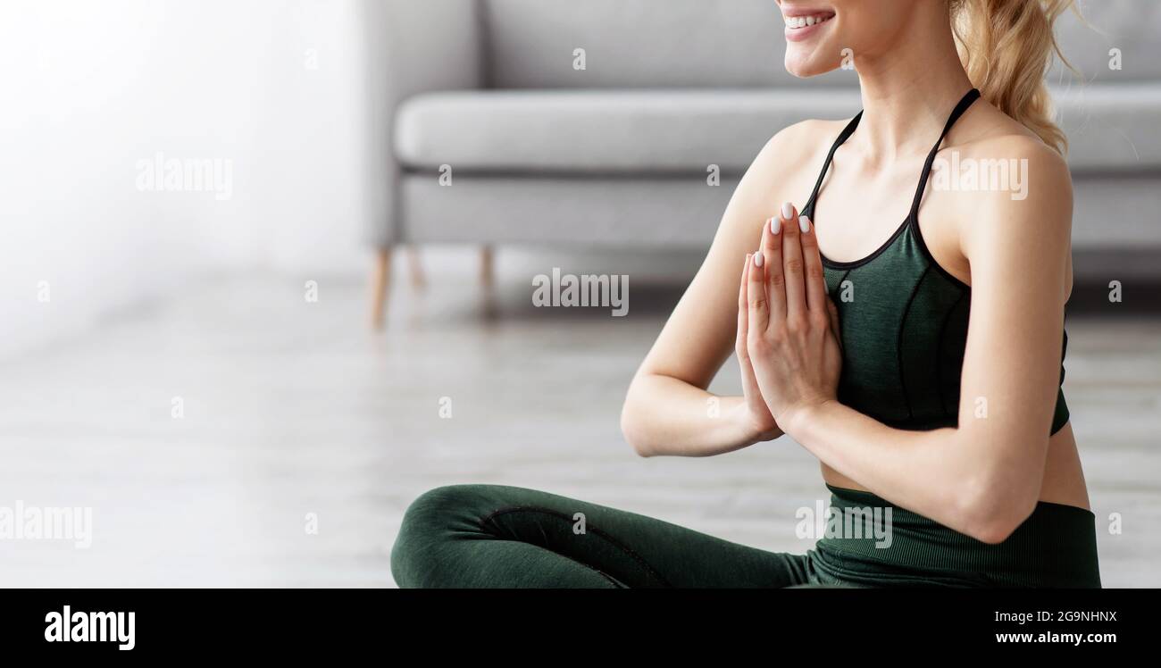 Breathing exercises, meditation alone at home, peaceful, covid Stock Photo