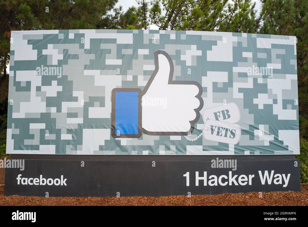 Sign with logo featuring the distinctive Thumbs Up symbol of Facebook, decorated for Veterans Day, at the headquarters of social network company Facebook in Silicon Valley, Menlo Park, California, November 10, 2017. (Photo by Smith Collection/Gado/Sipa USA) Stock Photo