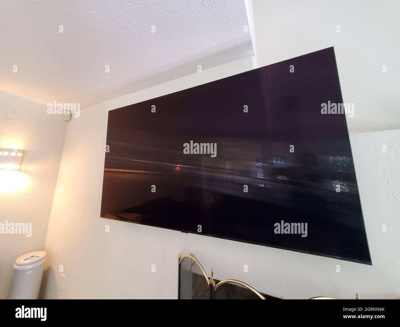 Samsung brand Q80T QLED 75 inch television mounted on the wall of a home in  Lafayette, California, June 15, 2021. (Photo by Smith Collection/Gado/Sipa  USA Stock Photo - Alamy