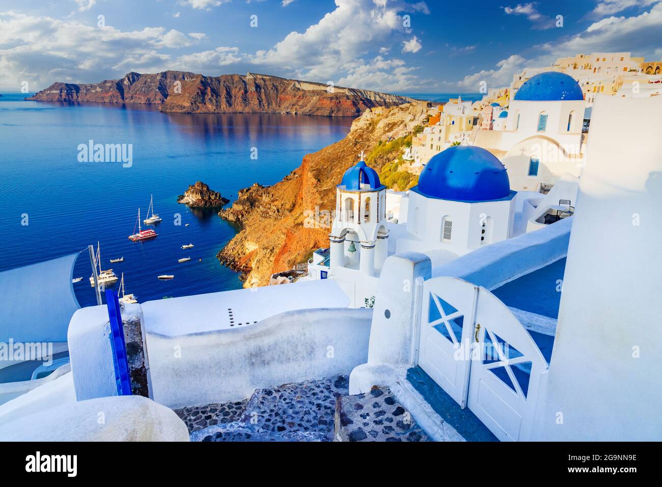 Santorini, Greece. Amazing whitewashed city of Oia, Thira in Greek Cyclades Islands, Aegean Sea. Holiday destinations of Europe. Stock Photo