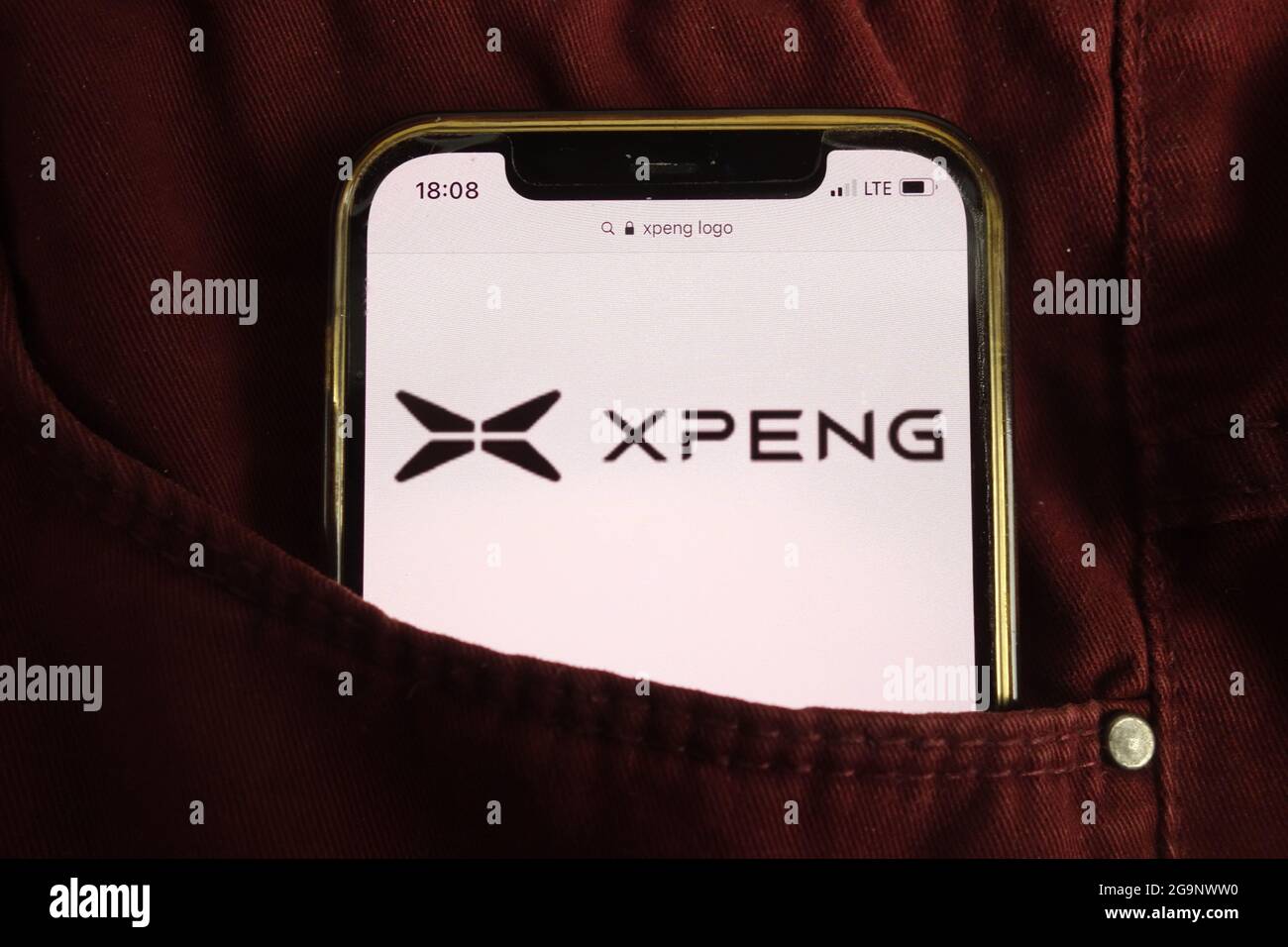 KONSKIE, POLAND - July 22, 2021: Xiaopeng Motors company logo displayed on mobile phone Stock Photo