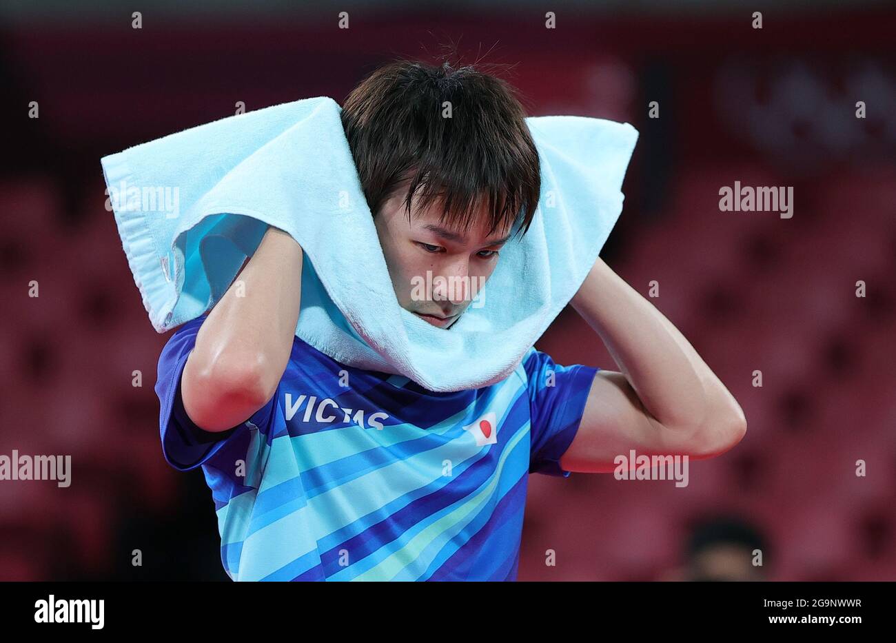 Tokyo, Japan. 27th July, 2021. Koki Niwa of Japan reacts after losing the table tennis men's singles round of 16 match against Dimitrij Ovtcharov of Germany at the Tokyo 2020 Olympic Games in Tokyo, Japan, July 27, 2021. Credit: Wang Dongzhen/Xinhua/Alamy Live News Stock Photo